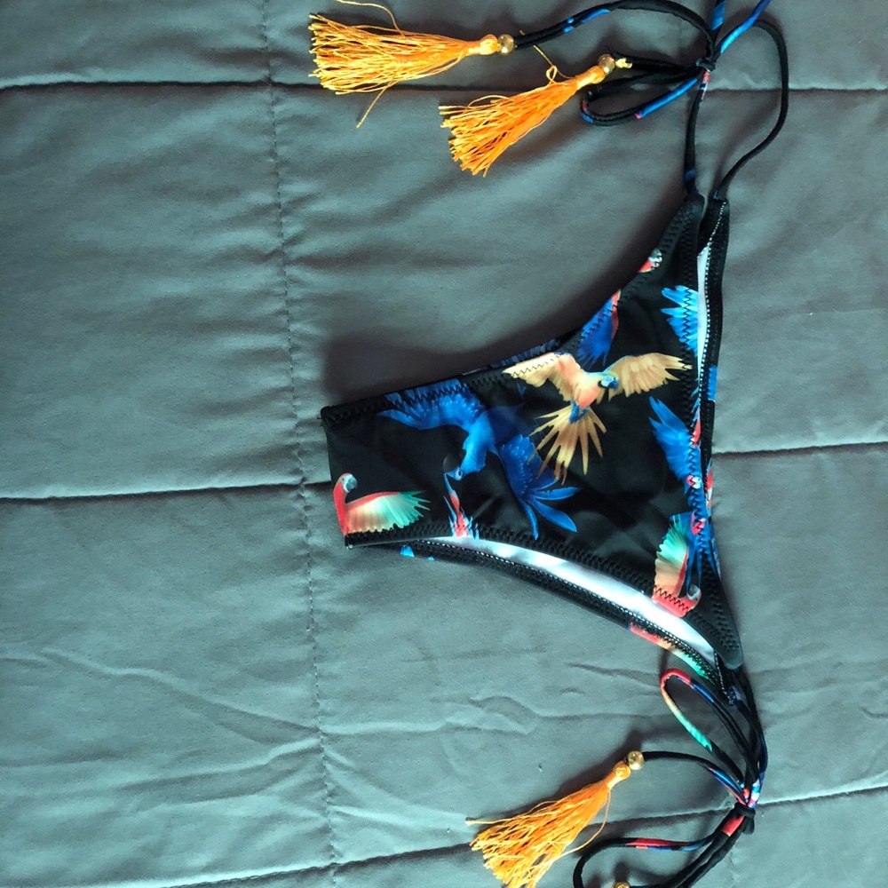 Bird print tassel tie swim bottoms